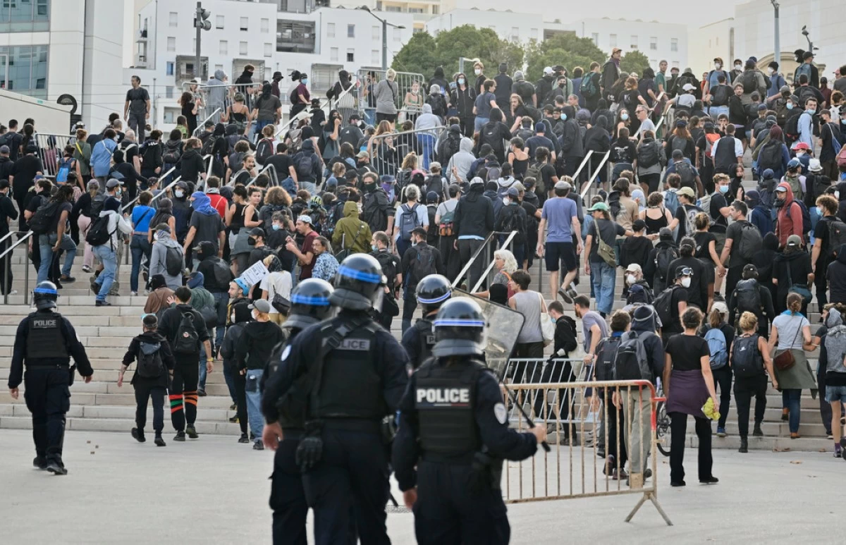 French police disperse protesters during a gathering of the 