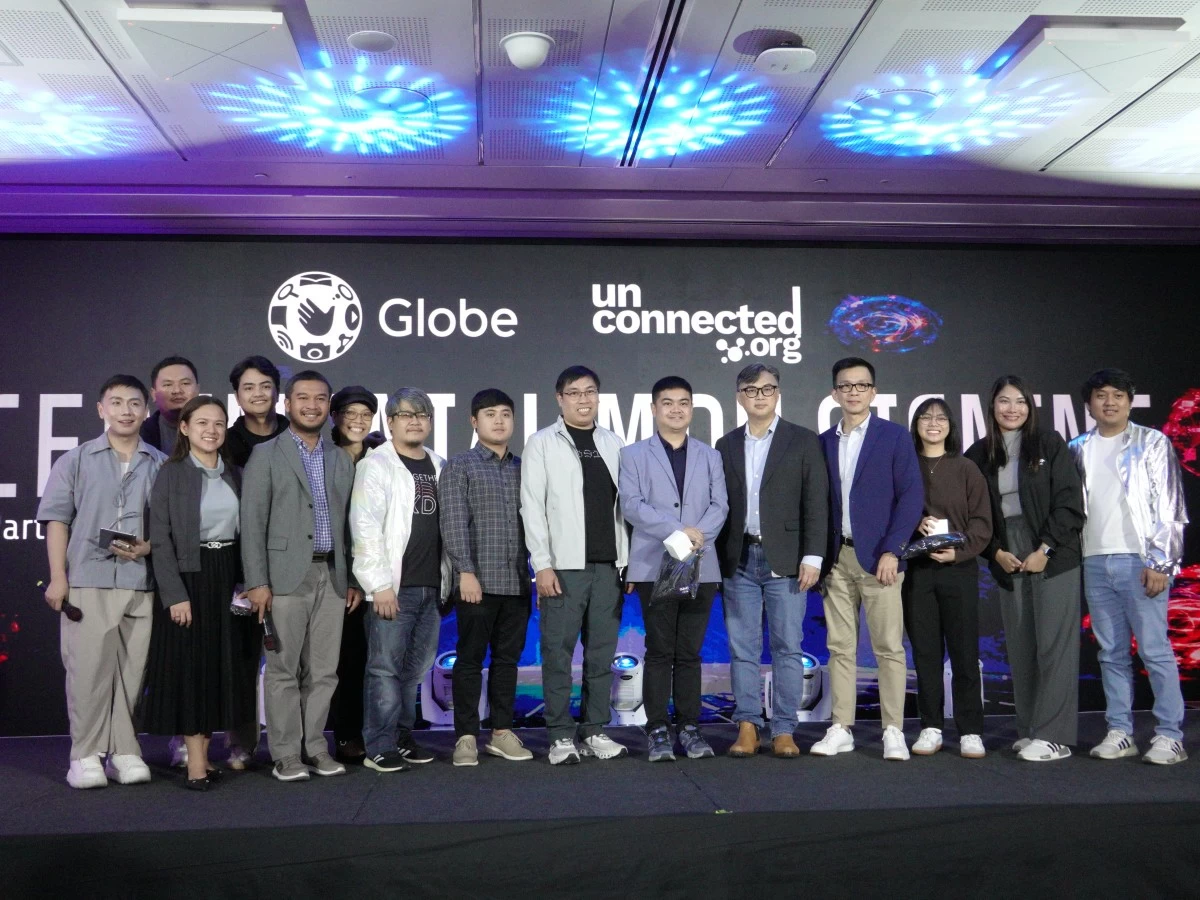 Globe and unconnected.org representatives at Innovania 2025, formalizing a partnership to deliver sustainable internet to remote schools and uplift last-mile communities in the Philippines.
