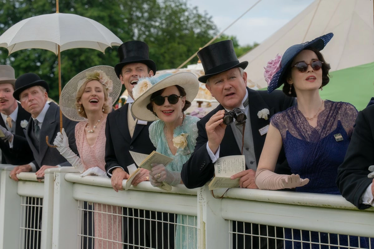 From left: Laura Carmichael stars as Lady Edith, Harry Hadden-Paton as Bertie Hexham, Elizabeth McGovern as Cora Grantham, Hugh Bonneville stars as Robert Grantham, and Michelle Dockery as Lady Mary in 'Downton Abbey: The Grand Finale.' (Images by Rory Mulvey/Focus Features )