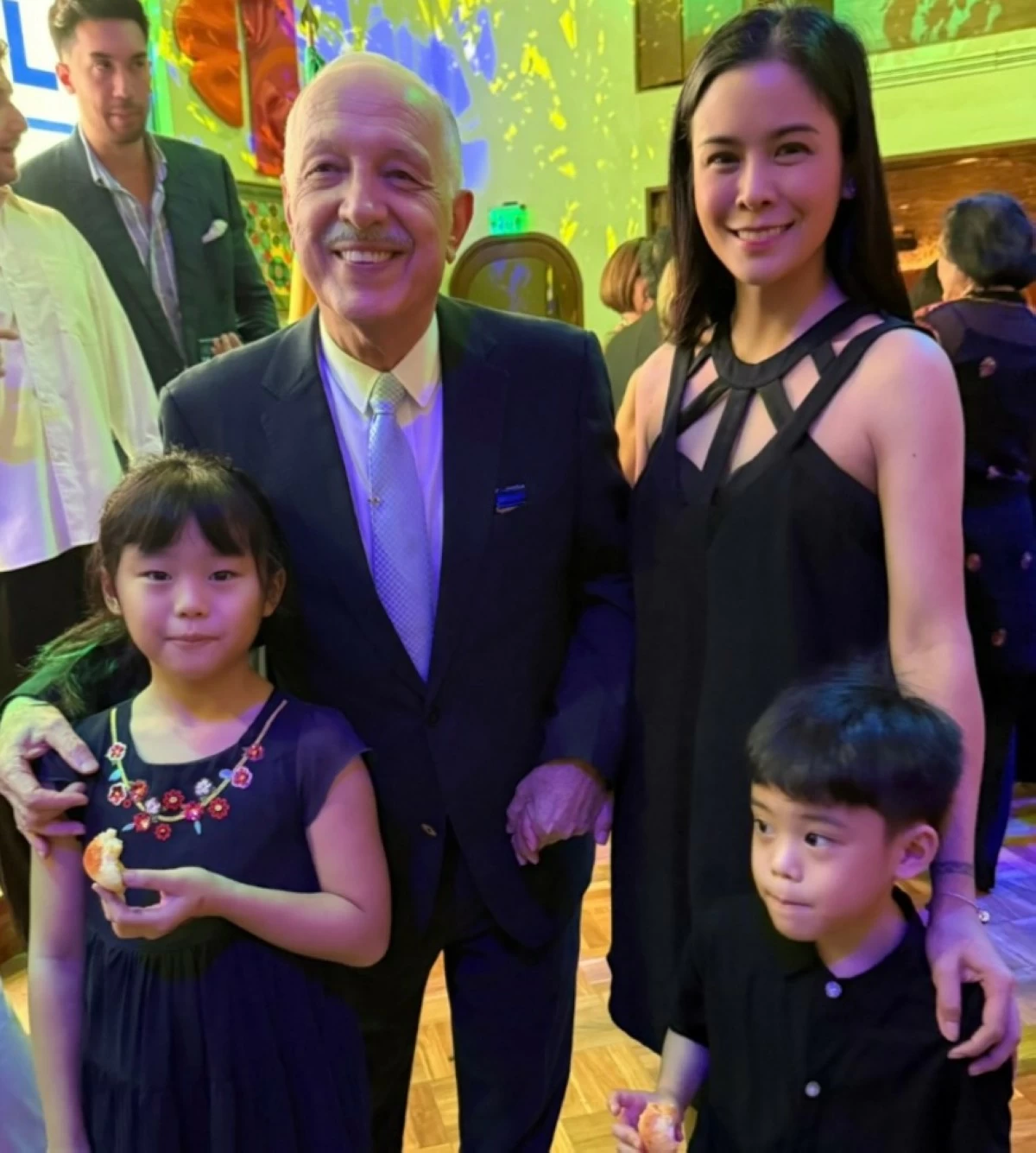 Ambassador Gilberto Moura poses with the family of Kristine Soguilon-Lim, an artist and Goodwill Ambassador of the Navy of the Philippines