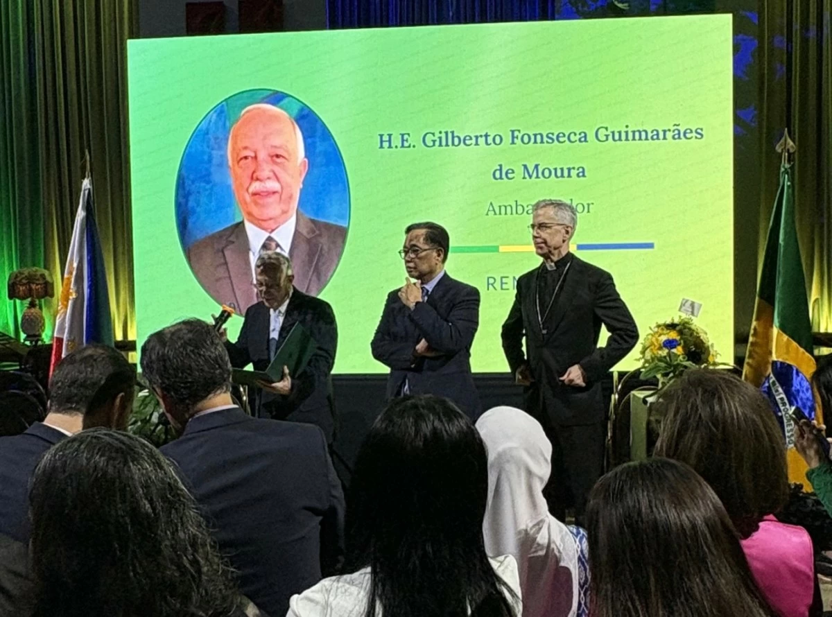 Gilberto Fonseca Guimarães de Moura, Ambassador  of the Embassy of Brazil delivers his welcome remarks. Joined on stage by  Undersecretary Leo Herrera-Lim of the Department of Foreign Affairs and Archbishop Charles John Brown, Apostolic Nuncio