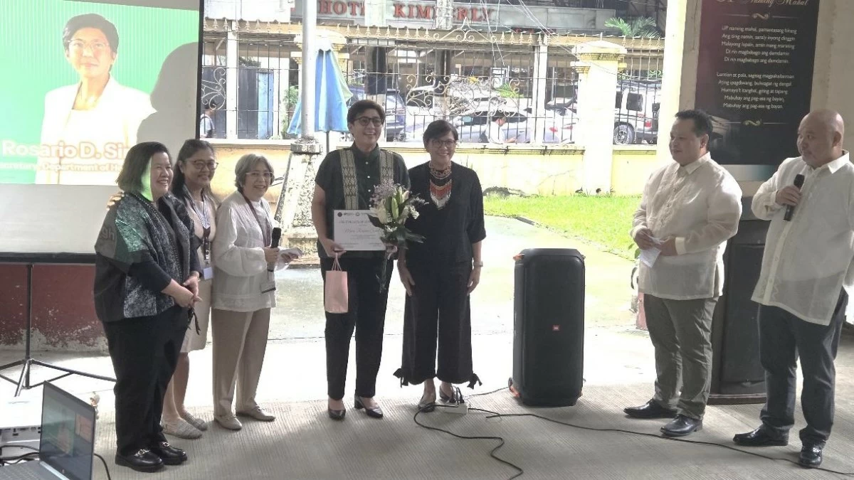 A SPECIAL GUEST Former DOH Secretary Maria Rosario Singh-Vergeire at the National Institutes of Health Flag Raising ceremony with UP Manila Officials (From left: UP College of Medicine Dean Dr. Charlotte Chiong, Institute of Clinical Epidemiology Director Dr. Carmela Lapitan, NIH Executive Director Dr. Marissa Alejandria, Former NIH Executive Director Dr. Eva Maria Cutiongco-dela Paz, NIH Research Faculty Members Dr. Emmanuel Estrella and Dr. Emmanuel Baja.)