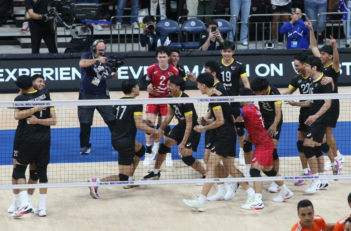Alas Pilipinas players erupt in celebration after scoring a historic win over African powerhouse Egypt Tuesday, Sept. 16, in the FIVB Men's World Championship at the Mall of Asia Arena. (Mark Balmores/MB)