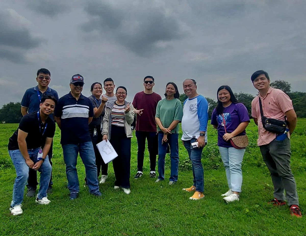 From plans to the field: Arch. Pam de Guzman with her colleagues during a site inspection, where collaboration brings designs to life.