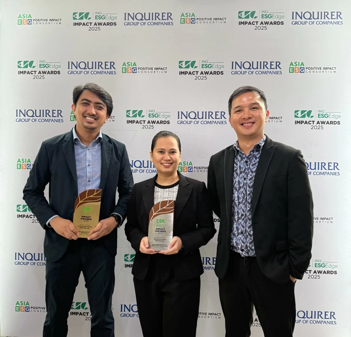 Maynilad officers (from left): Benson Jhon
Martin (Manager, Central NRW), Apple Joy Albero (Assistant Manager for Quality, Sustainability and Resiliency), and John Emmanuel Martinez (Sustainability Head).