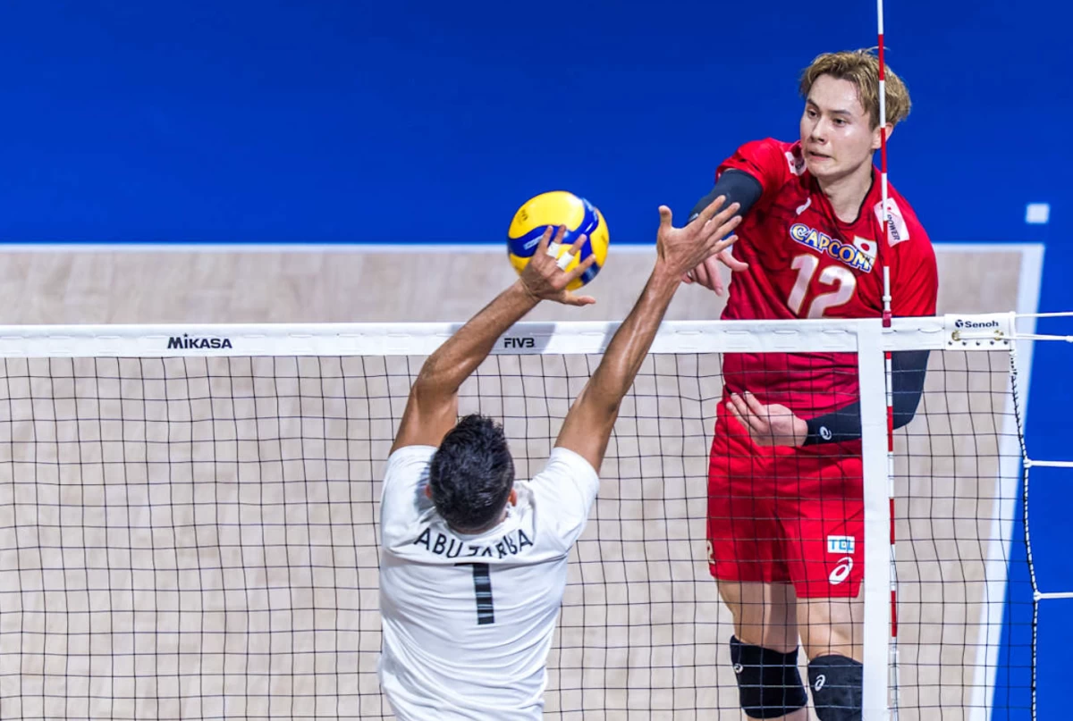 Ran Takahashi scores for Japan during their match against Libya. (Volleyball World)