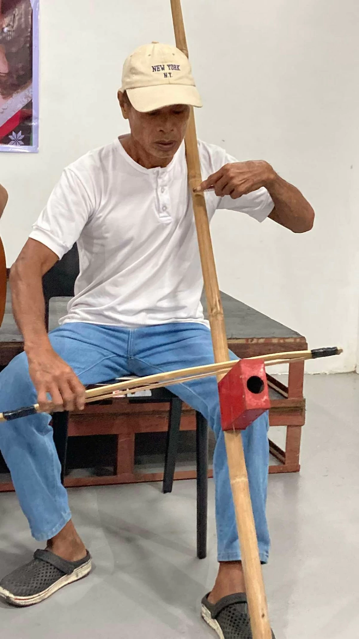 PLAY US A TUNE Liberato Ibon plays a tune on the instrument his father created. 