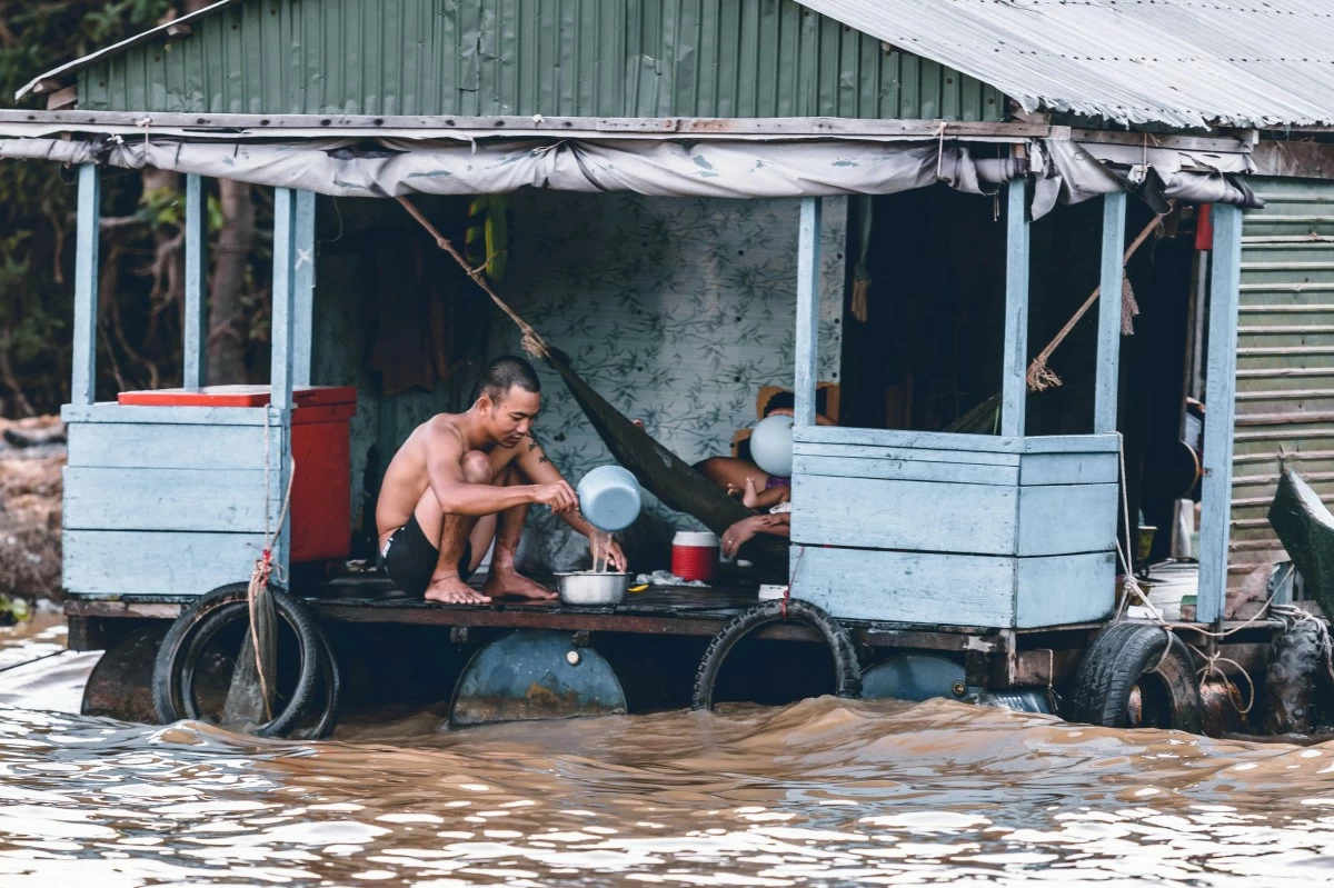 A family is stranded at home after a downpour resulted in heavy flooding.