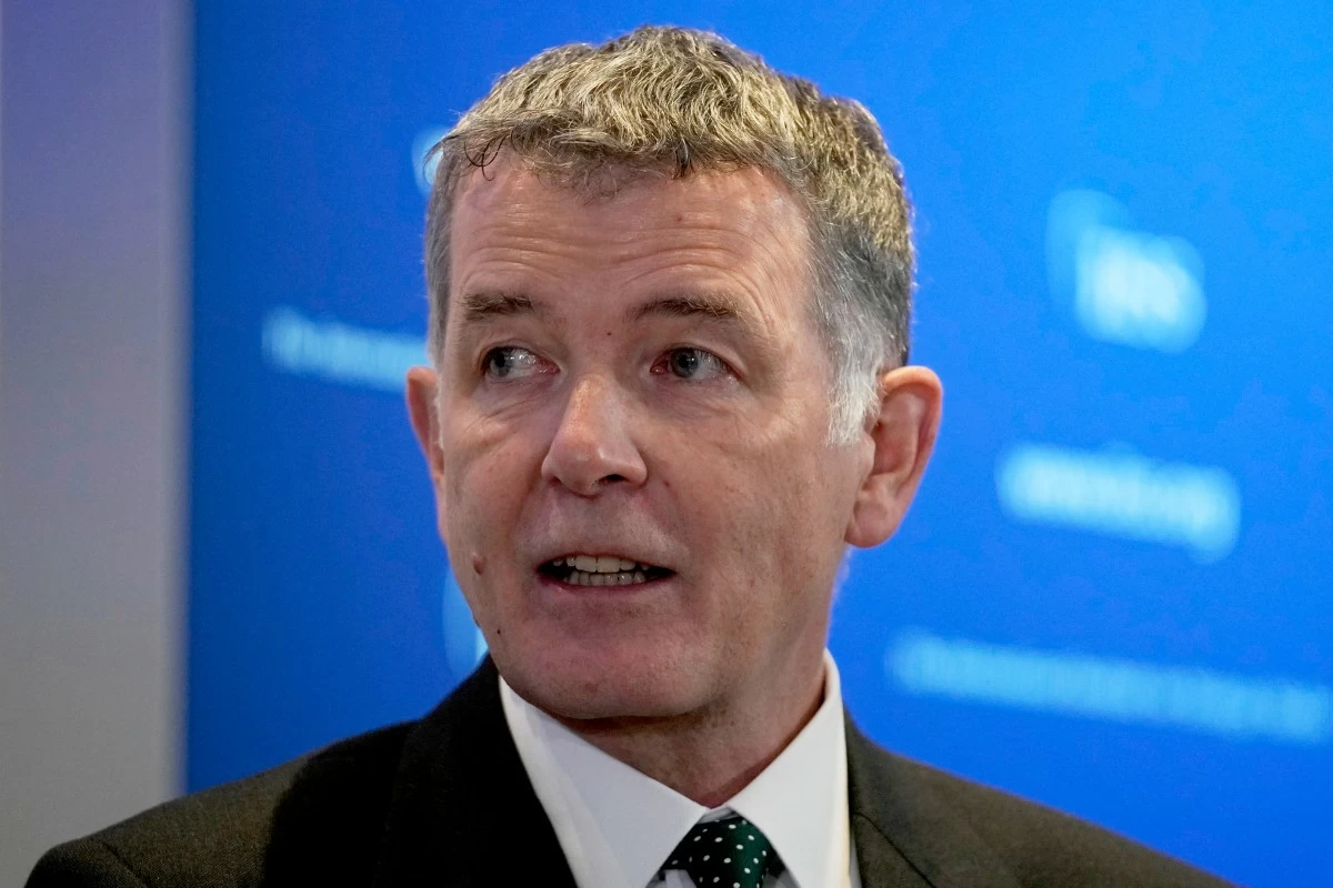 FILE - Richard Moore, the Chief of Britain's Secret Intelligence Service, also known as MI6, answers questions in London, England, Nov. 30, 2021, after giving his first public speech since becoming head of the organization. (AP Photo/Matt Dunham, File)