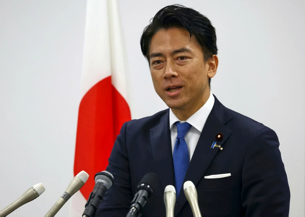 Japan's Agriculture Minister Shinjiro Koizumi, who is the son of former prime minister Junichiro Koizumi, attends a press conference about his running in the ruling Liberal Democratic Party leadership race in Tokyo, Japan, Saturday, Sept. 20, 2025. (Issei Kato/Pool Photo via AP)