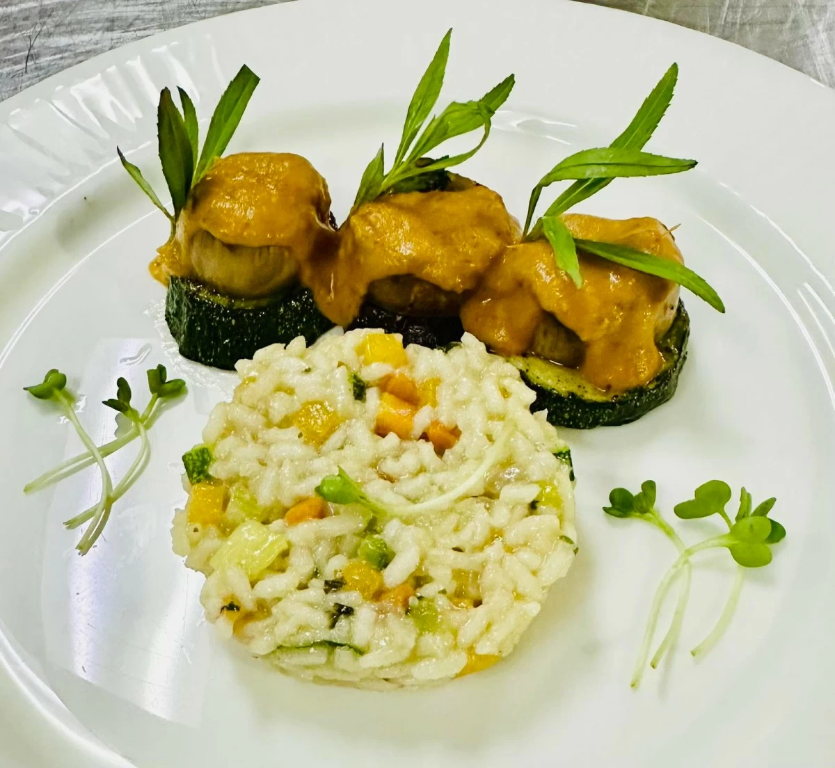 GARDEN COMFORT Risotto primavera with mushroom scallop, fried eggplant, zucchini, and tomato coulis highlights the new vegan degustation menu at The Manila Hotel