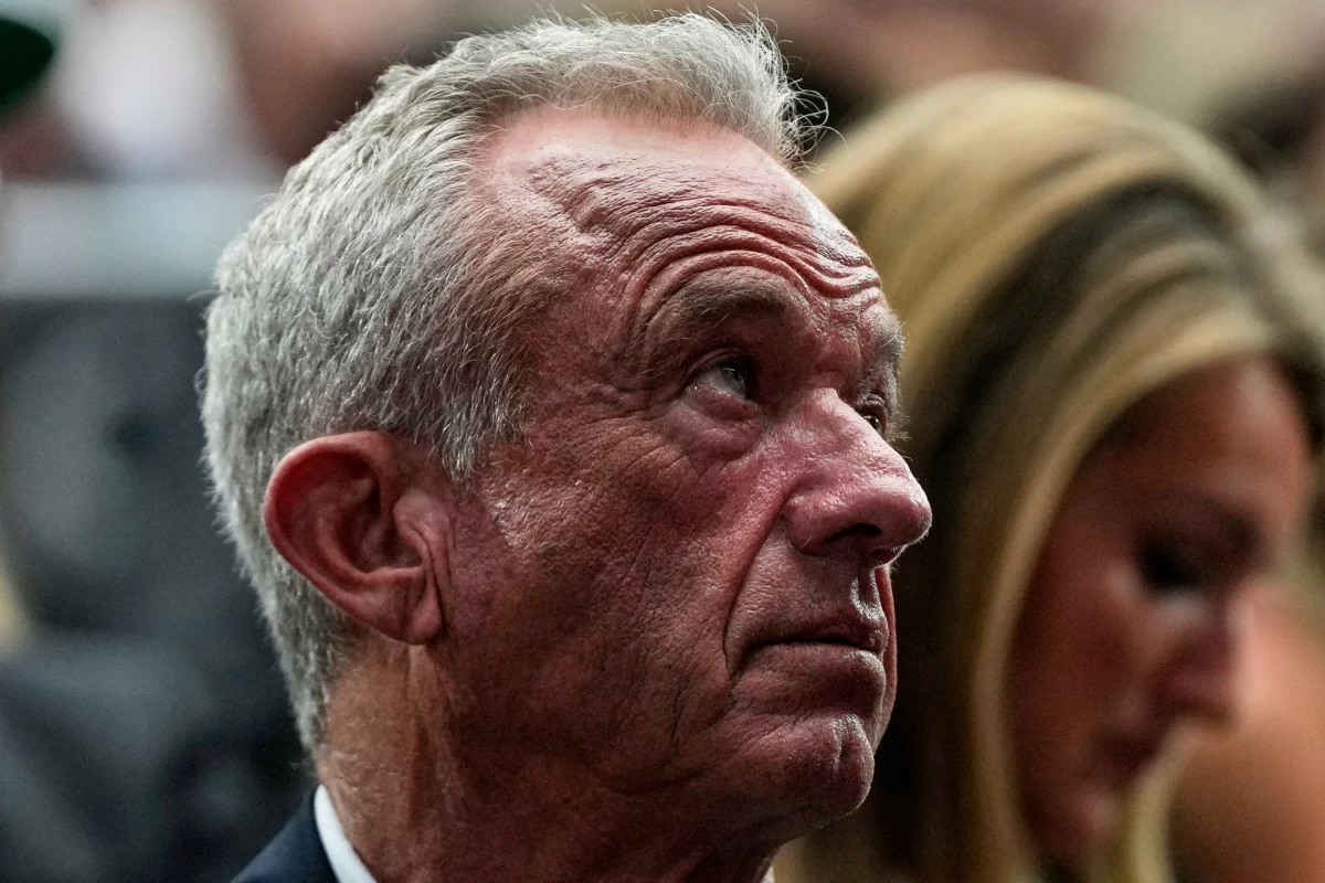 Health and Human Services Secretary Robert F. Kennedy Jr. attends a memorial for conservative activist Charlie Kirk, Sunday, Sept. 21, 2025, at State Farm Stadium in Glendale, Ariz. (AP Photo/Julia Demaree Nikhinson)