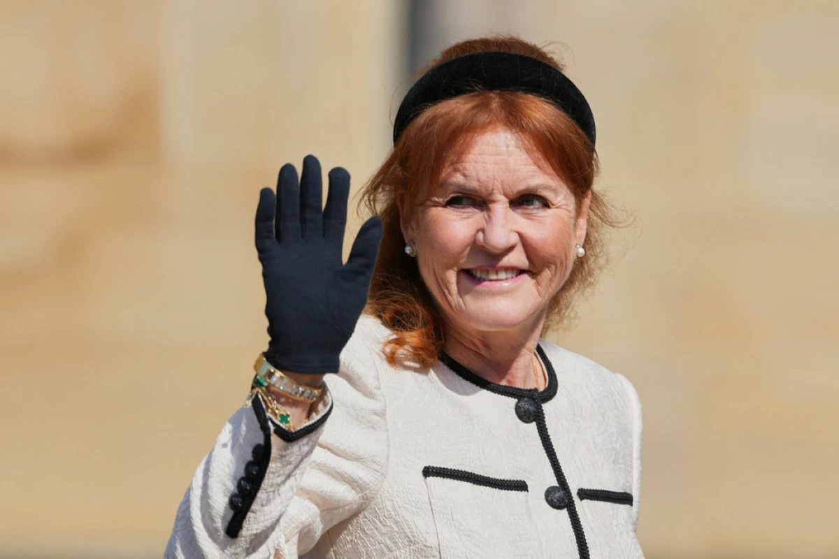 Sarah Ferguson waves to the crowd as she attends the Easter Matins Service at St. George's Chapel, Windsor Castle, England, on April 20, 2025. (AP Photo/Kirsty Wigglesworth, Pool, File)
