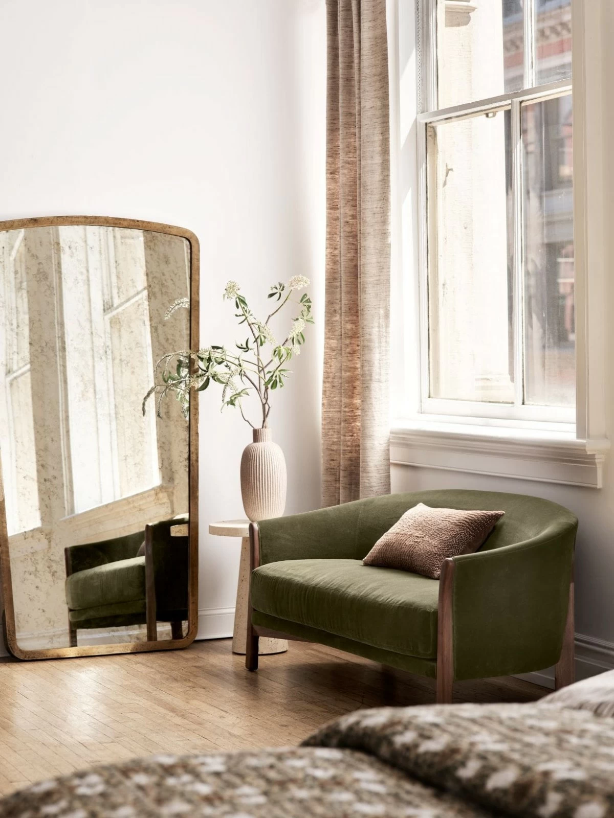 Upholstered in your choice of olive green velvet, or ivory boucle, the small sofa provides a comfortable yet supportive sit with a tight back, medium firm seat cushion and hand-tied seat suspension, the gold standard for lasting comfort and support.
