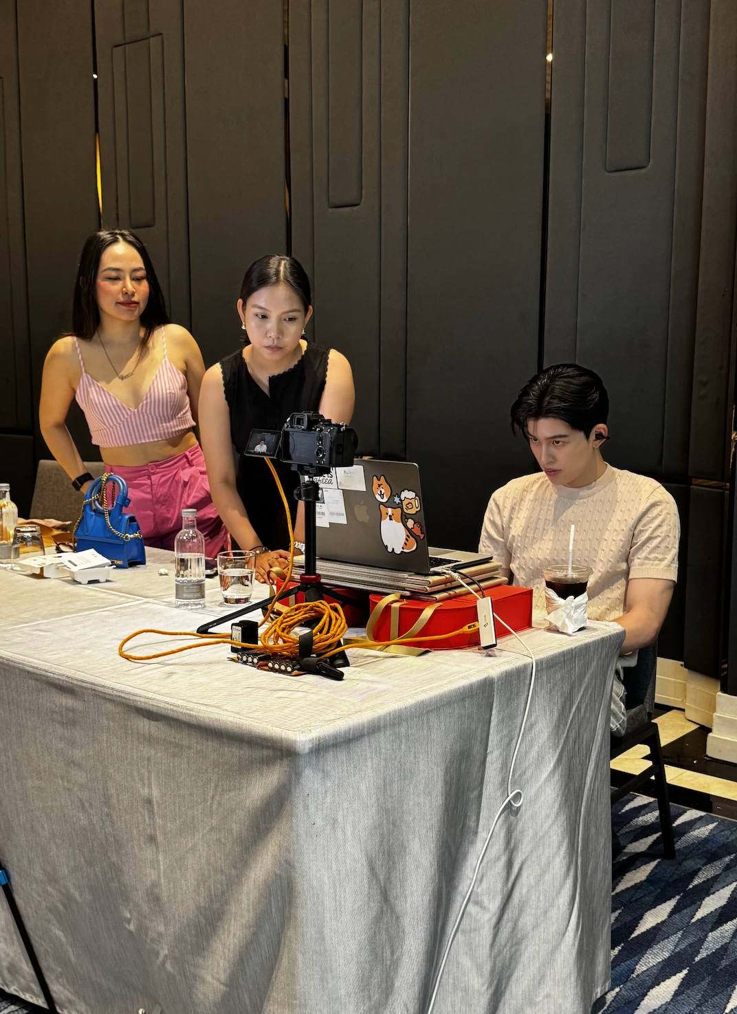 CSMO Denice Sy, and EB Brand Manager Rafeea Custodio help check to make sure Pond's fan call is running smoothly
