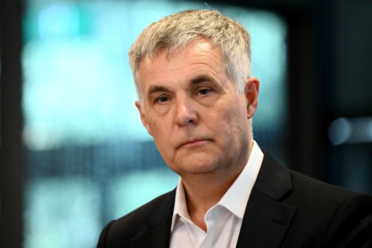 Optus Chief Executive Officer Stephen Rue speaks to the media during press conference in Sydney, Wednesday, Sept. 24, 2025. (Bianca De Marchi/AAP Image via AP)
