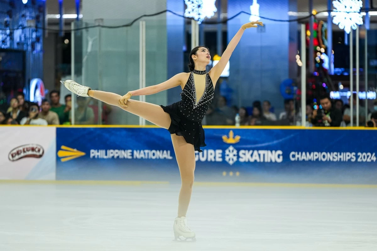 Skye Chua, national figure skater and 2025 Winter University Games competitor, performing her routine with grace and power.
