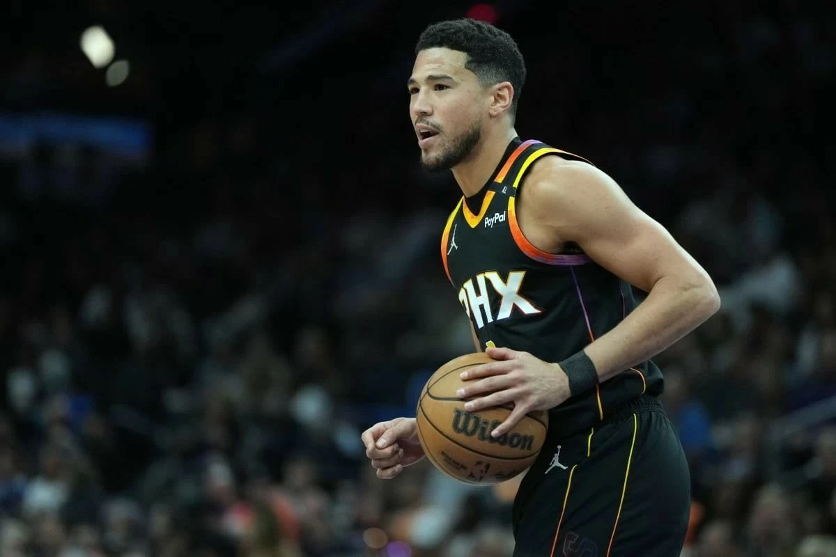 FILE - Phoenix Suns guard Devin Booker (AP Photo/Rick Scuteri, File)
