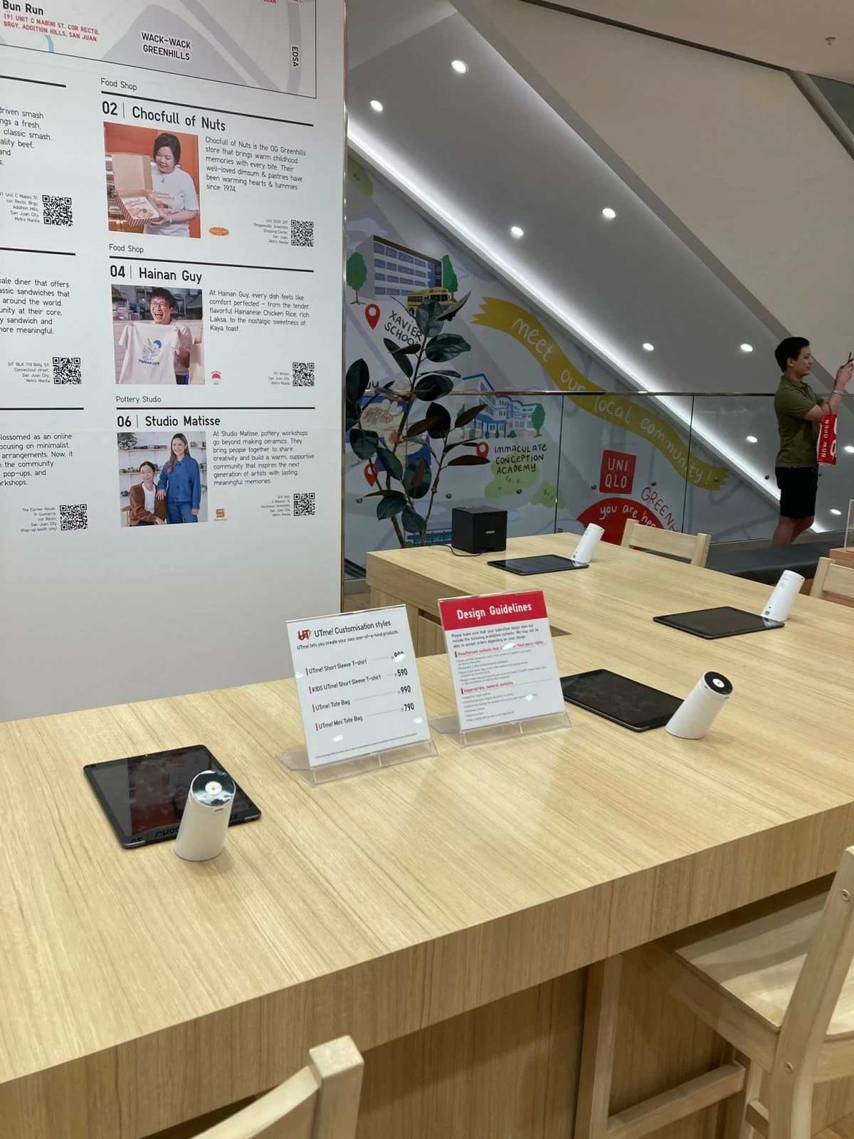 MAKE YOUR OWN OOTD Shoppers can create their own designs with Uniqlo's UTme! corner on the second floor. 