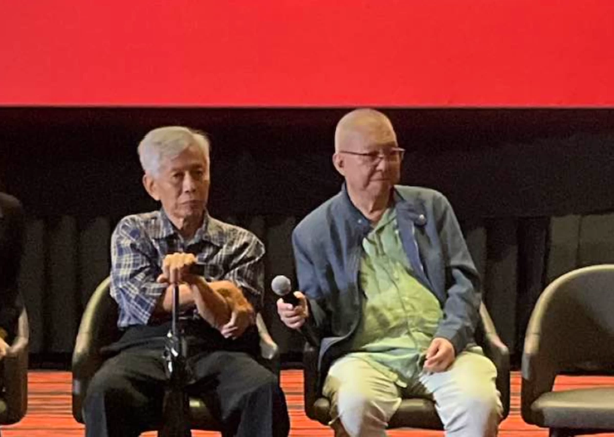 National Artist for Film and Broadcast Arts Ricky Lee (right) and Jose F. Lacaba, who both wrote the screenplay of 'Jaguar,' attend the opening of the 7th Sinag Maynila Independent Film Festival at Gateway in Araneta City.