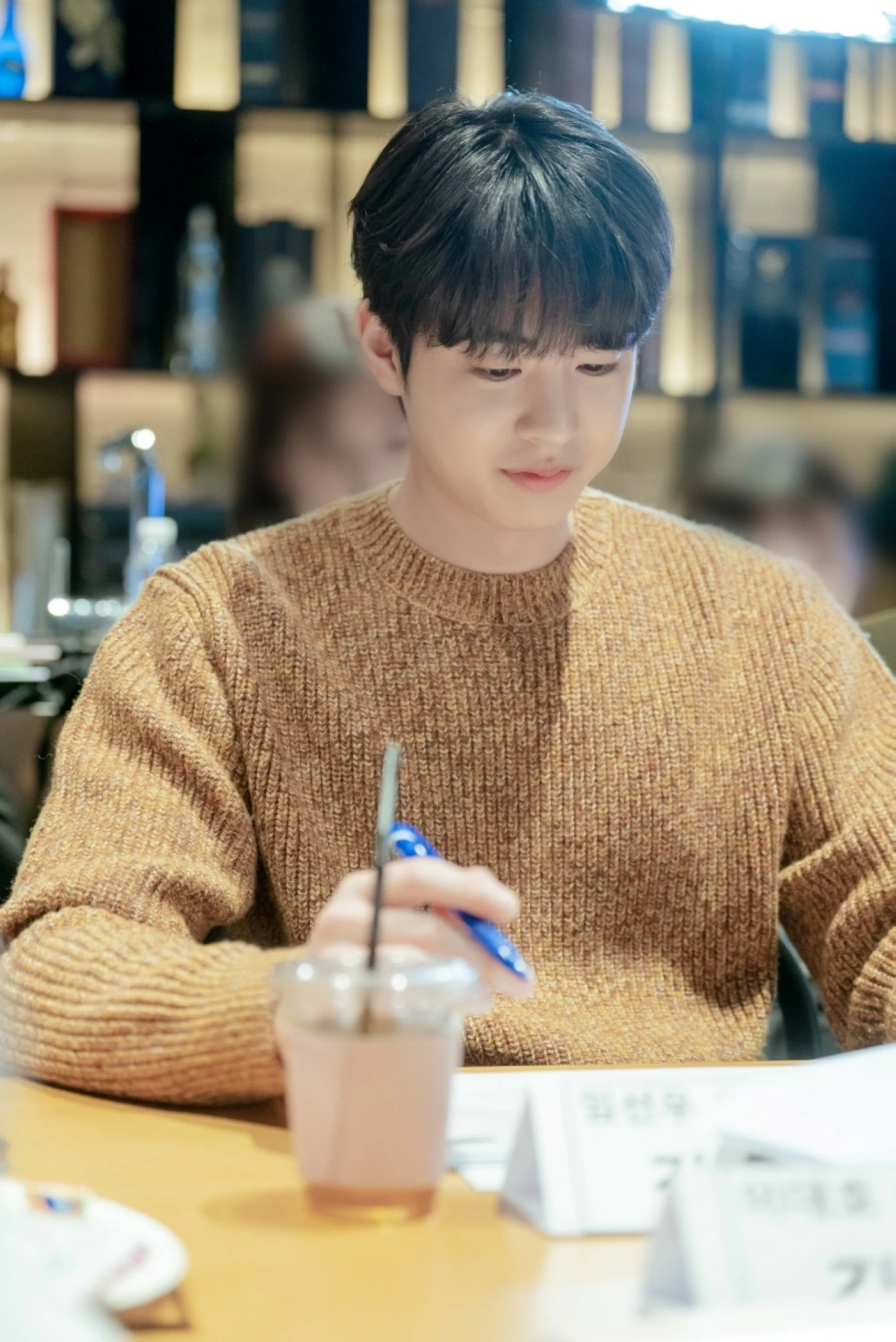 Kim Hyun-jin during a table-read for “Nice to Not Meet You” (Prime Video)
