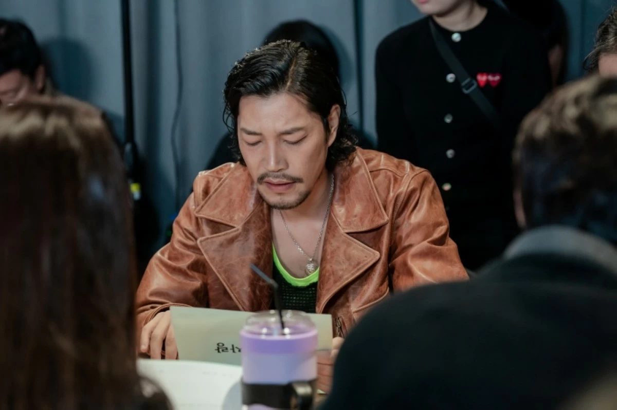 Choi Gwi-hwa during a table-read for “Nice to Not Meet You” (Prime Video)