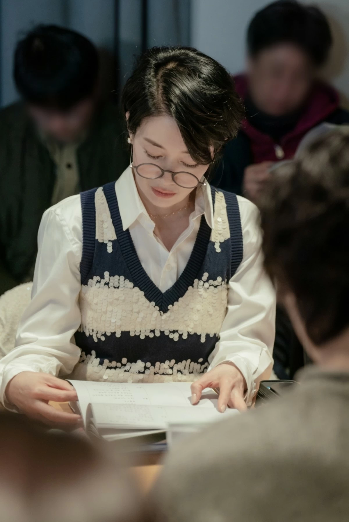 Na Young-hee during a table-read for “Nice to Not Meet You” (Prime Video)
