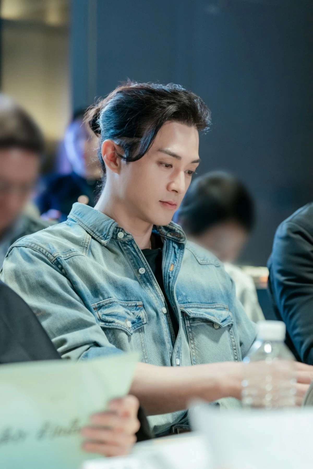 Kim Ji-hoon during a table-read for “Nice to Not Meet You” (Prime Video)
