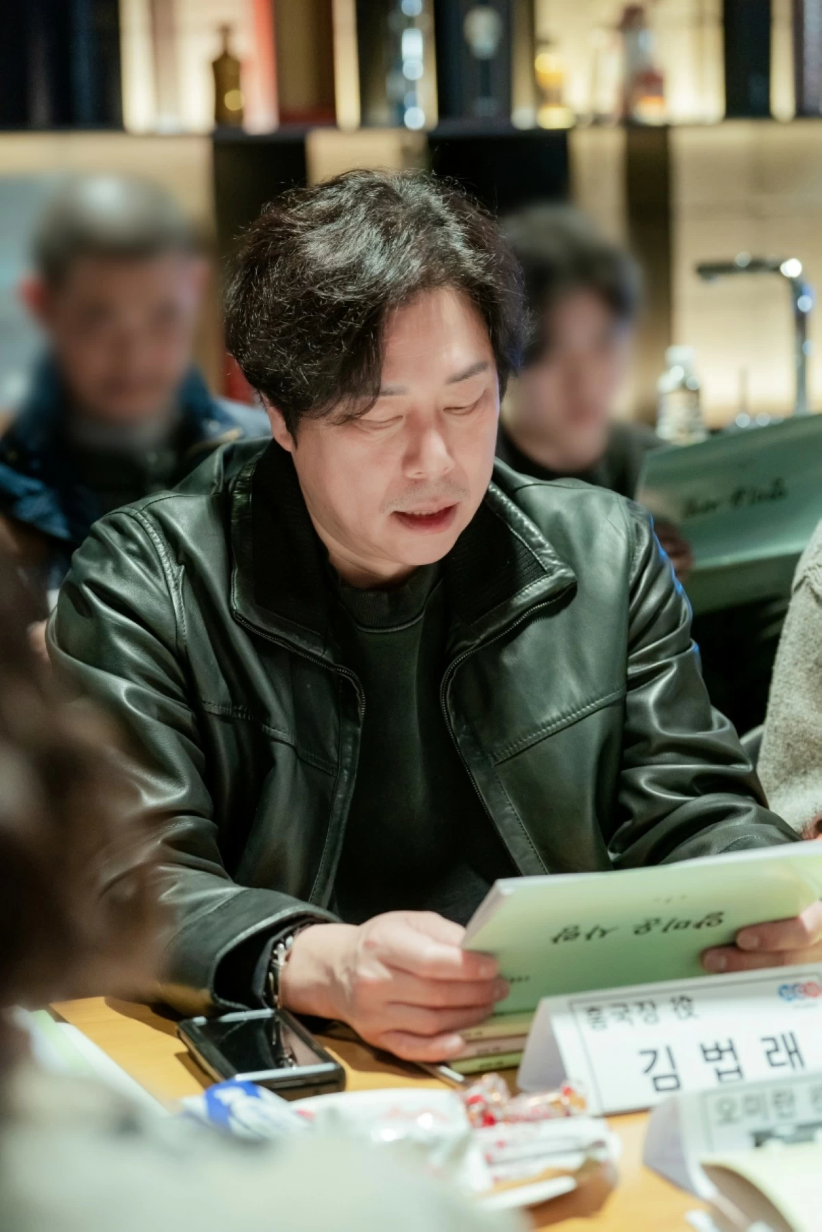 Kim Beop-rae during a table-read for “Nice to Not Meet You” (Prime Video)
