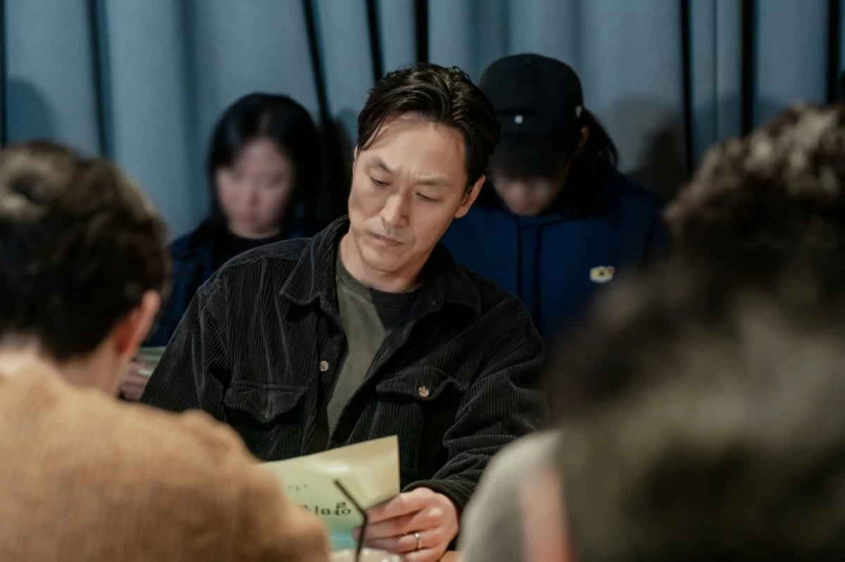 Kim Jae-chul during a table-read for “Nice to Not Meet You” (Prime Video)
