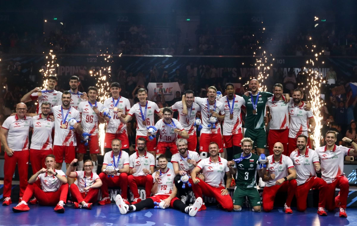 Members of Team Poland pose with their bronze medals in the FIVB Volleyball Men's World Championship. (Santi San Juan)