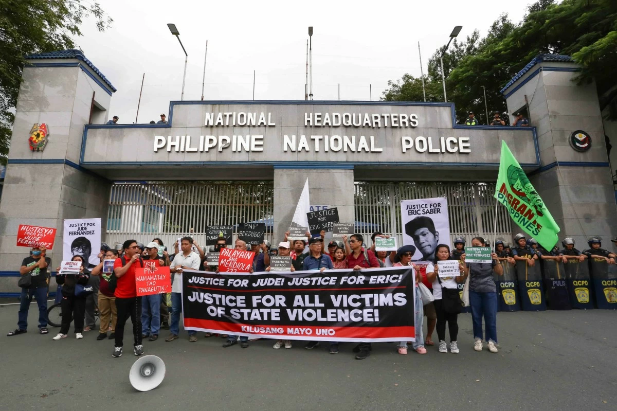 Workers from NCR and Southern Tagalog together with trade union and human rights advocates, stage a protest action in  Camp Crame in Quezon City on Monday, September 29, 2025, to mark the National Day of Action against Trade Union Repression. The groups demanded the immediate release of 277 rallyists arrested during the anti-corruption protest in Mendiola and called for justice for Eric Saber, a construction worker who was allegedly slain by state forces during the September 21 Mendiola rally. (Santi San Juan)