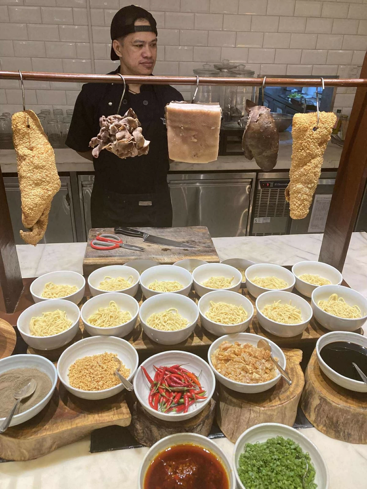 DINNER IS SERVED The Granary's La Paz Batchoy station for the night.