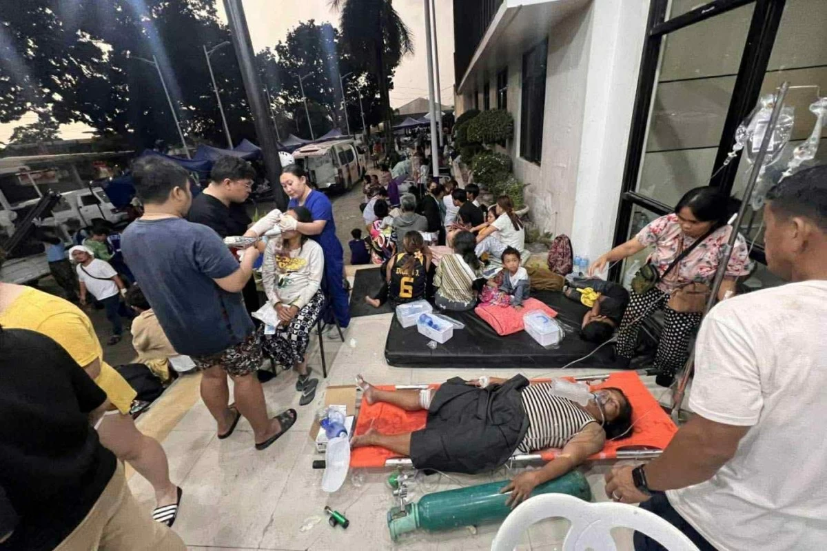 Patients wait outside Cebu Provincial Hospital in Bogo City after a strong earthquake struck the area in Cebu province on Wednesday, Oct. 1, 2025. (AP Photo)

