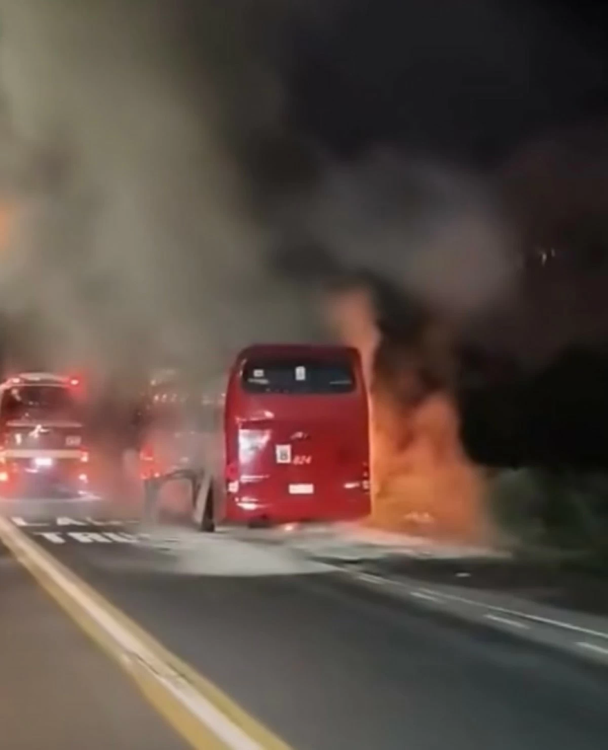 The bus filled with Grade 1 students, teachers, and parents, catches fire along the North Luzon Expressway in Marilao, Bulacan on Oct. 1, 2025.