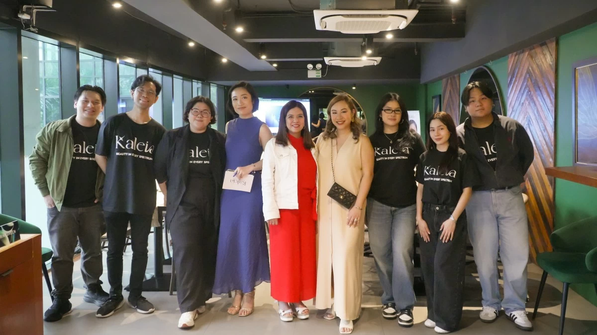 Country Manager Micah Alvarado-Diaz (center in beige dress) with the Kaleia team