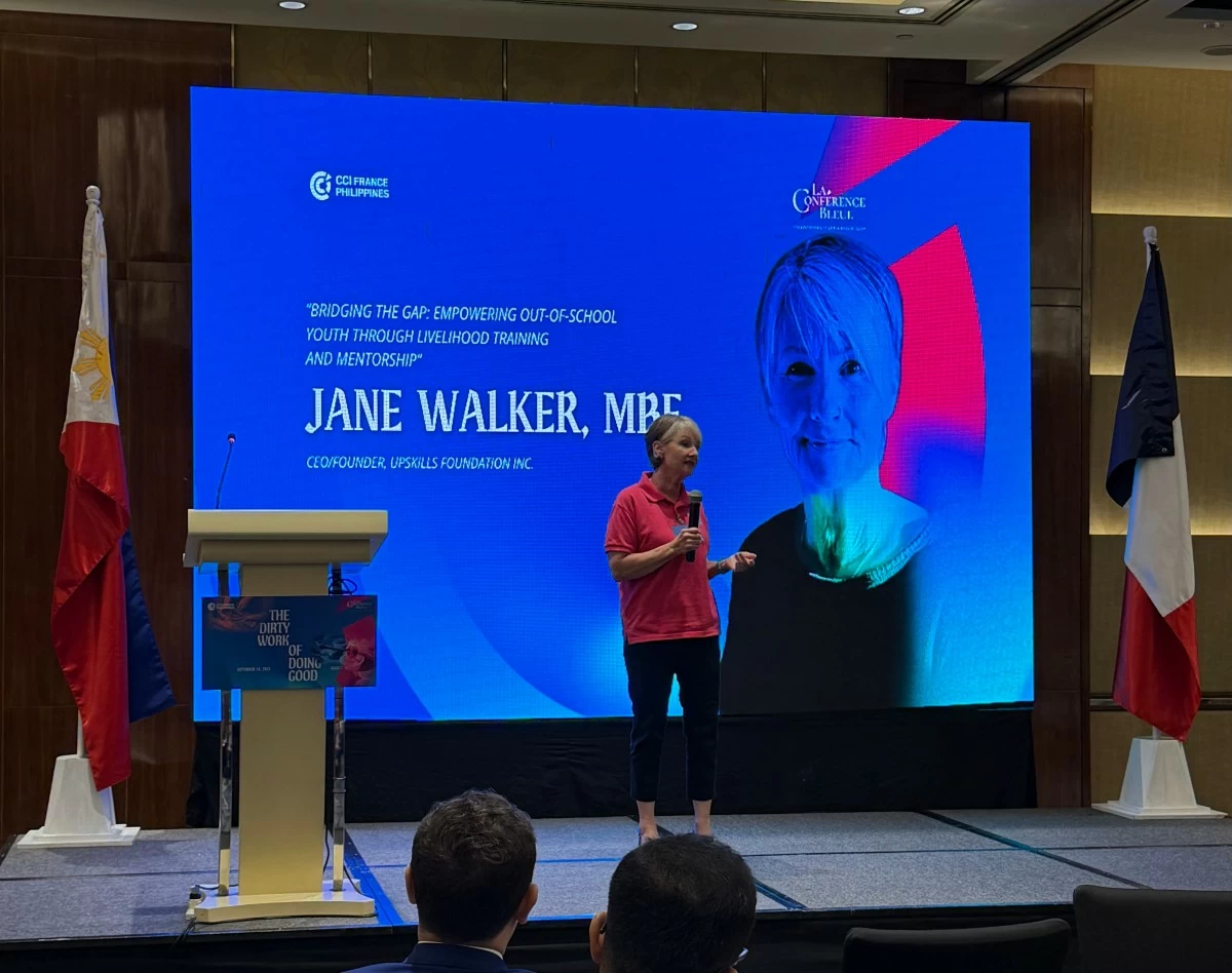 Jane Walker, MBE, of Upskills Foundation Inc., at the rostrum. 