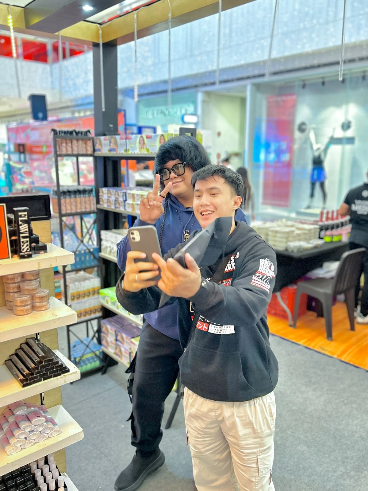 Influencer-entrepreneur Pau Sepagan of NYT Apparel shares a fun selfie moment with a fan during the VIYLine MSME Caravan at SM City Pampanga.