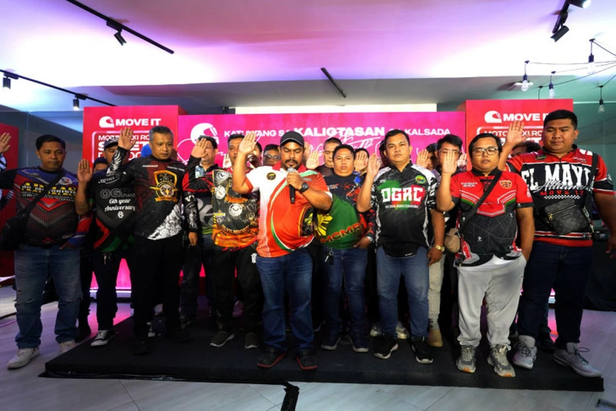 Motorcycle Community Philippines Chairman, Romeo Maglunsod, leads the rider-partner communities in pledging to co-champion a safety-first culture in the motorcycle-taxi industry.