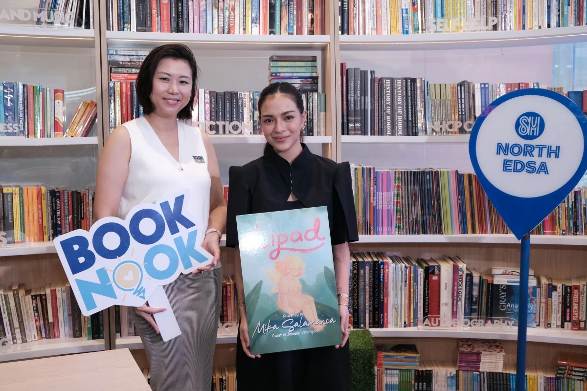 PBB big winner Mika Salamanca with Shereen Sy, Pioneer of Book Nook for SM Supermalls, celebrating their shared mission of bringing families together and inspiring children to discover the joy of reading.