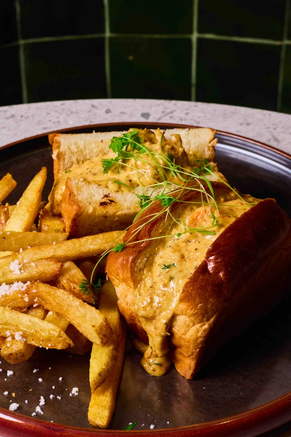 SEA PAIRING A soft bun filled with sweet prawn and crab delivers layers of richness and comfort in every bite.