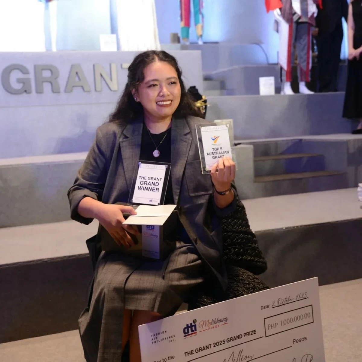 Deya presenting her wins, which includes a P1 million cash prize