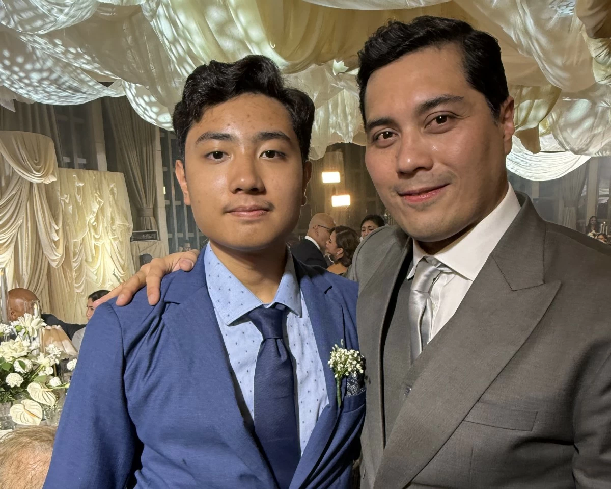 Gian with his son, who performed Elvis and Johnny Cash songs