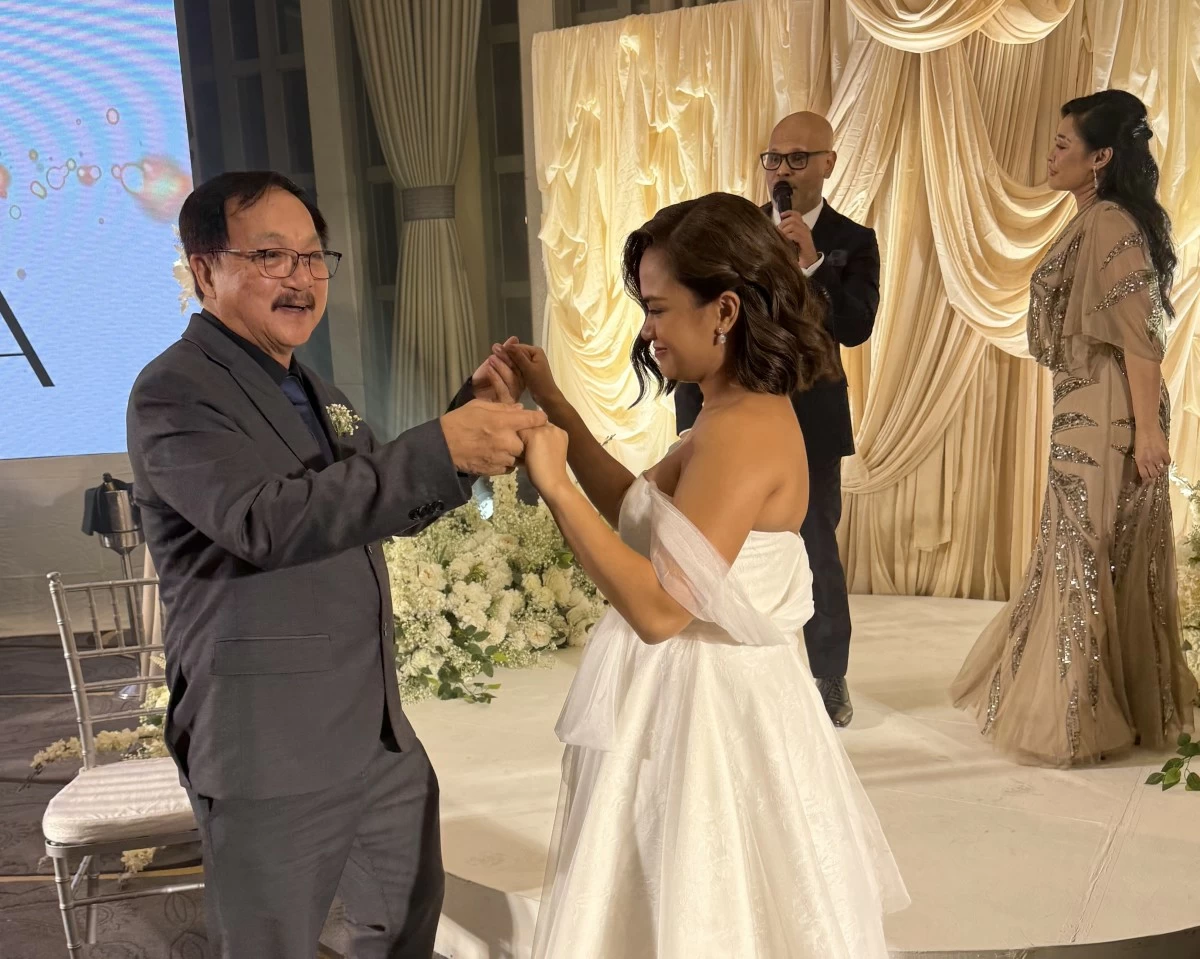 Lara with her father