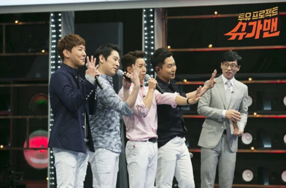 Jang Hae-young (2nd from left) with other F-IV members and host Yoo Jae-suk (extreme right) on the show 