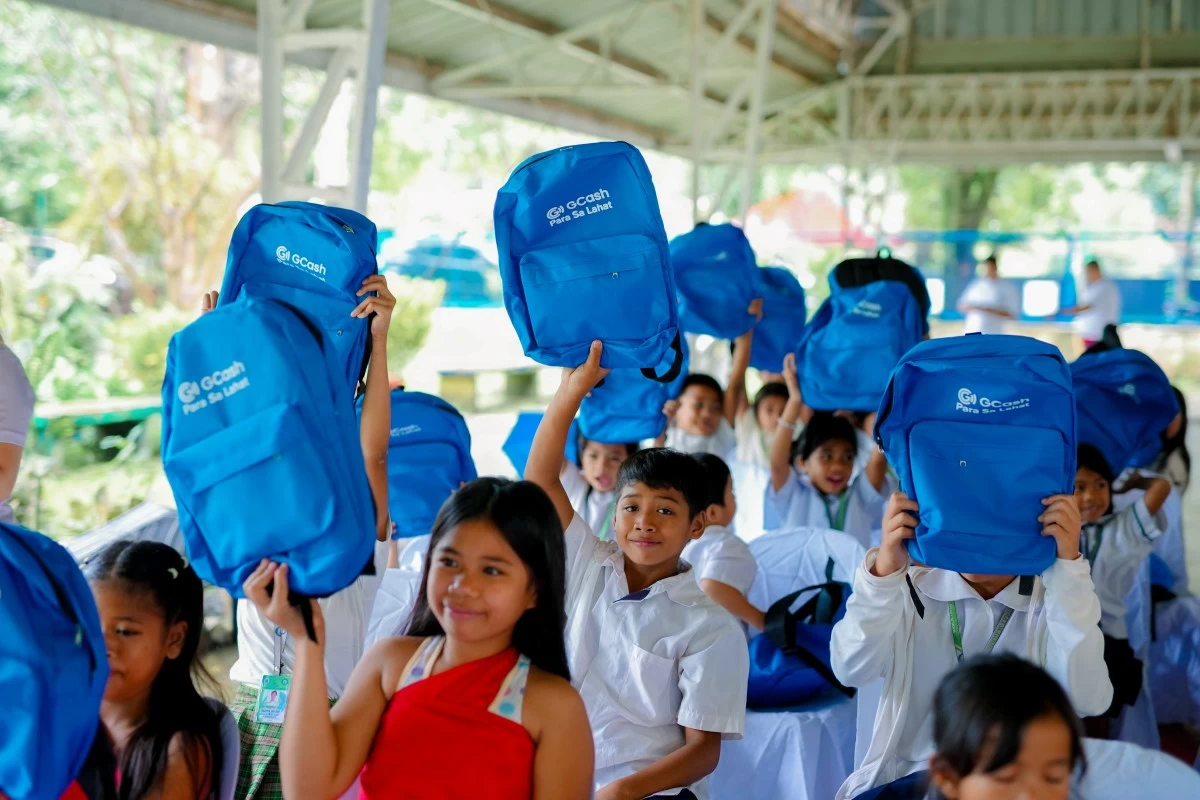 Learners of Cayabu Elementary and High School proudly raise the school supplies they received through the Her Legacy Project. By providing much-needed resources to learners in underserved areas, the project helps open doors to greater opportunities, ensuring that every child has the tools to learn, grow, and thrive.
