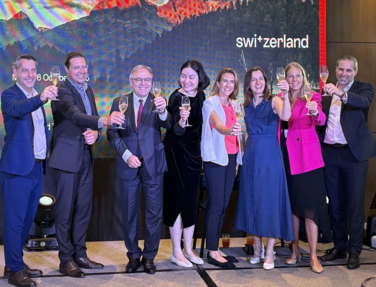 Ambassador Nicolas Brühl leads the Switzerland Tourism team in a celebratory toast at the gala dinner.