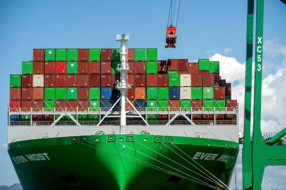 FILE - Shipping containers line the Ever Most cargo vessel docked at the Port of Oakland on April 3, 2025, in Oakland, Calif. (AP Photo/Noah Berger, File)