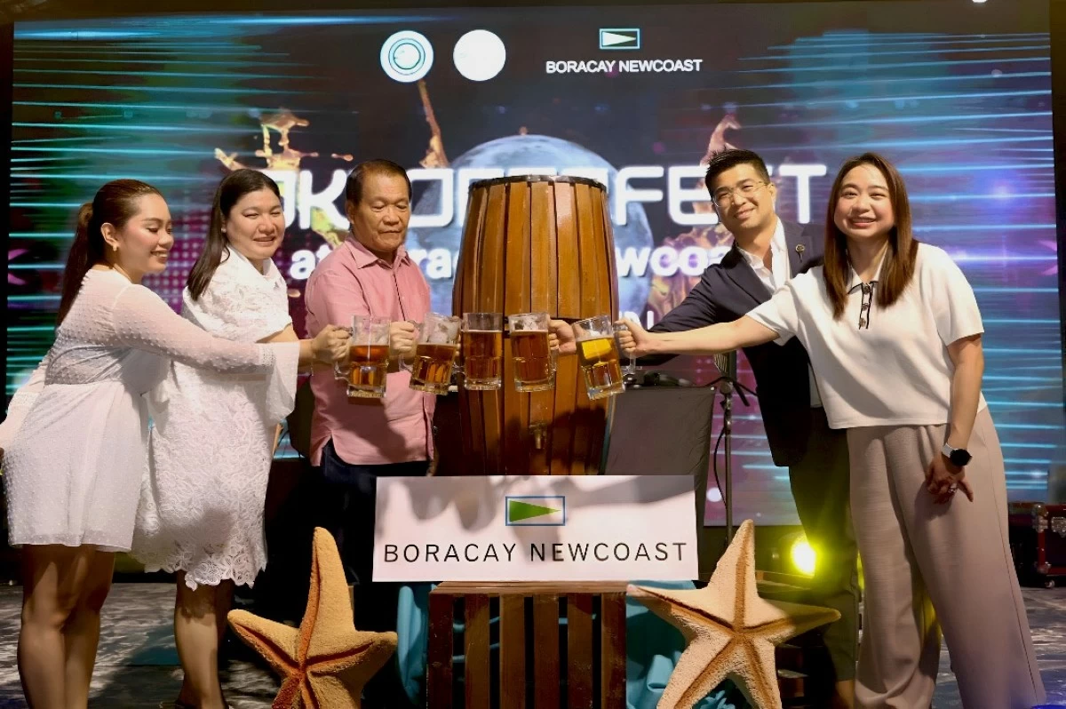 TAPPED TRADITION Local government officials join Megaworld representatives in the ceremonial tapping of the first keg, marking the start of Boracay Newcoast’s month-long Oktoberfest celebration by the sea