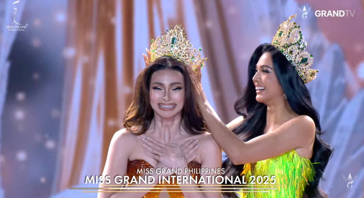 Outgoing Miss Grand International CJ Opiaza of the Philippines crowns Emma Tiglao, also of the Philippines, as Miss Grand International 2025.